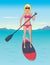 Stand Up Paddle Boarding Woman On The Water