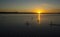 Stand up paddle on Rio Tocantins, during sunset, in Carolina, Maranhao, Brazil.