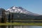 Stand Up Paddlers Enjoy Summer Morning at Sparks Lake, Oregon