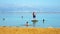 Stand up puddle boarder on the Dead Sea