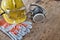 Standard construction safety equipment on wooden table. top view