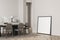 Standing canvases in light beige dining room. Corner view
