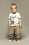 Standing caucasian blond boy child portrait