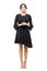 Standing classy formal woman in black dress with hand clasped looking at camera