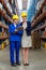 Standing female coworkers smiling