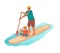 Standing man with boy is paddling with paddle board on the water