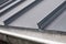 Standing seam metal roof and gutter