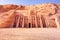 Standing statue in front of The Temple of Hathor and Nefertari