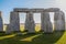Standing stones of Stonehenge-the worlds most famous prehistoric monument - Closeup from inside the circle with dramatic shadows