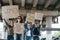 Standing under bridge. Group of feminist women have protest for their rights outdoors