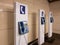 Stands with old telephones at shopping mall