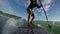 Standup paddle board surfing waves early morning beach
