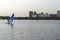 Standup paddleboarding are on the river Moscow, Strogino