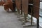 Stapled chairs and tables of a  closed terrace restaurant in Lucerne, Switzerland. Gastronomy establishments are under lockdown.