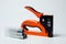 Stapler household, new, orange, reliable with staples