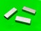 Stapler refill pins cartridge isolated in a green background