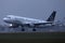 Star Alliance Lufthansa airplane landing, approaching airport