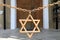 Star of David on chain in Synagogue Yegia-Kapai