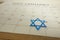 Star of David marking calendar date January 27, 2022, Holocaust memory day