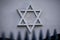 Star of David, symbol of Judaism on wall.