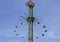 Star Flyer carousel in Amusement Park, Tivoli Gardens, view on the decorative top, Copenhagen, Denmark