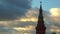 Star rotating above Moscow Kremlin tower, time lapse with beautiful clouds