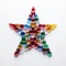 Star shape made of multicolored glass beads on a white background