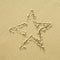 Star sign on a sand