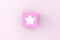 Star symbol on a pink cube block. Customer experience, rating and evaluation. Client satisfaction