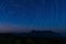 Star trail above Doi Luang mountain seen from Doi Ma Taman camping site