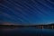 Star trails at Lake of Two River, Algonquin, Ontario Canada