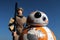 Star Wars LEGO figure of Rey Skywalker in desert outfit with Sphero BB-8 droid from Star Wars movies.