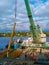 Staraya Ladoga, Leningrad region, Russia - August 2017. Drilling technique on water driving metal piles