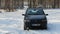 Stare Splavy, Czech republic - December 09, 2012: black car Fiat Punto II parked on a snowy forest road during winter tourism in