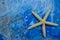 Starfish on blue and white abstract painting