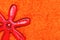 Starfish on red bath towels