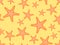 Starfish seamless pattern on a sandy beach. Summer background for promotional products, wrapping paper and printing. Vector