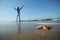 Starfish and tranquil woman on the beach