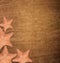 Starfishes on wooden background