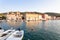 STARI GRAD, CROATIA - AUGUST 2019 Late afternoon sunlit houses in the little port of Stari Grad on Hvar Island 1544