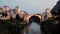 Stari Most bridge at twilight in old town of Mostar, BIH