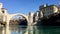 Stari Most Old Bridge panaroma landscape with wild ducks city of Mostar in Bosnia