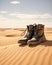 Stark Contrast: Leather Boots Against Sandy Desert Expanse