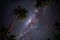 Starry night above Palm trees on the tropical island of Samoa