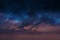 Starry night blue sky on pink sunset nebula  Aurora borealis milky way dramatic clouds cosmic space weather background