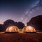 Starry Night Martian Dome Tents under the Wadi Rum Desert Sky. Generative AI