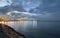 Starry night and moon at sunset sea harbor cruise line night light reflection on sea water seascape panorama Tallinn Estonia