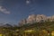 Starry night with mountain peak and town Cortina d`Ampezzo in Dolomites, South Tyrol, Italy