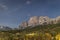 Starry night with mountain peak and town â€â€¹â€â€¹Cortina d`Ampezzo in Dolomites, South Tyrol, Italy