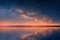 Starry night universe at  sea blue  pink cloudy sky sunset light reflection on water  reflection on horizon boat skyline  nature